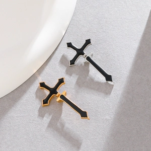 Gothic cross stud earrings in gold and silver finish with black enamel inlay detail