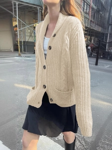 Beige button-down chunky knit cardigan for women featuring large buttons and front pockets