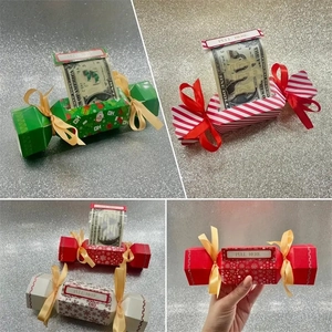 Christmas candy box cash dispenser showing pull-tab design and festive holiday patterns