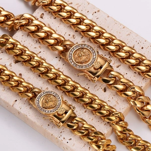 Gold stainless steel Cuban necklace with lion head pendant and pavé rhinestones on stone