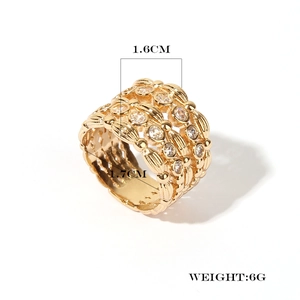Detailed view of gold plated wide band ring with dimensions 1.6cm width and 1.7cm diameter