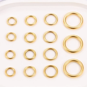 Polished gold stainless steel jump rings in various sizes for DIY jewelry making