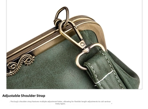 Close-up of vintage messenger bag with matte leather and adjustable metal shoulder strap