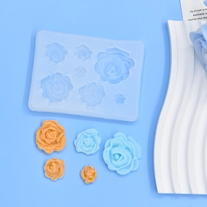 Close-up of 7-cavity rose silicone mold with detailed flower shapes for DIY baking