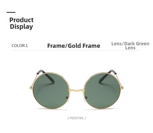 Front view of retro round sunglasses with gold metal frame and dark green lenses
