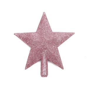Detail of pink glitter Christmas tree topper star with 3D five-point design on white background