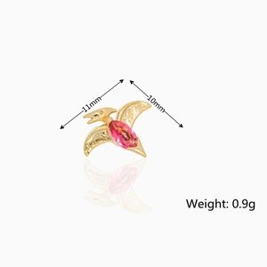 Detailed view of dinosaur earring showing dimensions 11x10mm and red zircon inlay