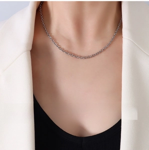 Detailed view of 3.2mm stainless steel cable chain necklace on a female model