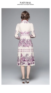 Rear view of long sleeve floral midi dress with pleated skirt and back zipper detail