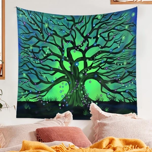 Detail of bohemian mandala tapestry featuring a glowing fantasy tree and magic forest design