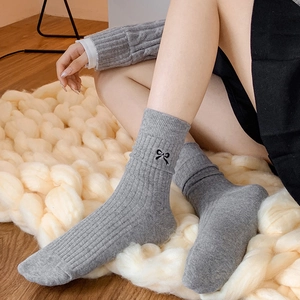 Gray striped mid-calf cotton socks with black bow embroidery for women's stylish wear