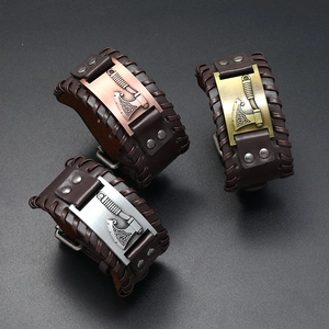 Three Viking axe leather bracelets in silver, bronze and gold metal finishes