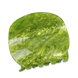Green marble textured hair claw clip with emerald swirl pattern for elegant updos