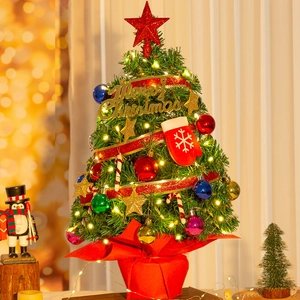 Close-up of 60cm mini desktop Christmas tree with LED lights and colorful ornaments