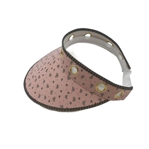 Pink visor hat for women featuring butterfly prints and a secure elastic strap