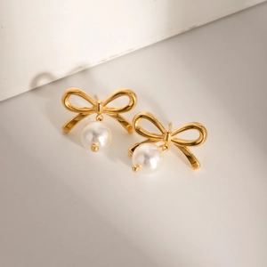 Elegant 18k gold plated stainless steel bow earrings with hanging round white pearls