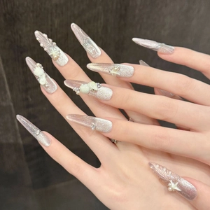 Luxury ocean style press-on nails with 3D starfish shells and pearls on silver cat eye base