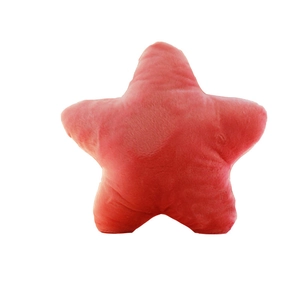 Modern red star-shaped plush pillow for sofa and chair decor with minimalist style