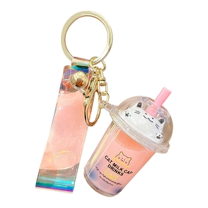 Creative cat milk tea cup keychain with liquid glitter flow and iridescent strap