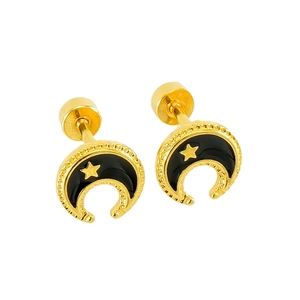 Detail view of crescent moon stud earrings with black enamel inlay and gold star