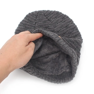 Men's dark gray knit beanie with thick plush lining for outdoor winter warmth and wind protection