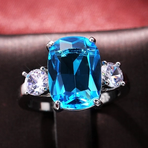 Bague de mariage élégante avec zircon bleu rectangle et anneau en argent