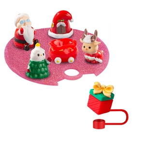 Detailed view of 5-piece Christmas themed silicone straw toppers with Santa and reindeer