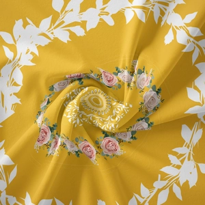 Macro detail of Bohemian tapestry showing yellow fabric texture and pink rose pattern