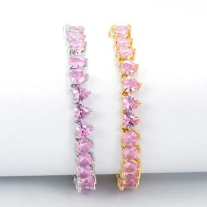 Minimalist heart bracelet with pink cubic zirconia in gold and silver finishes