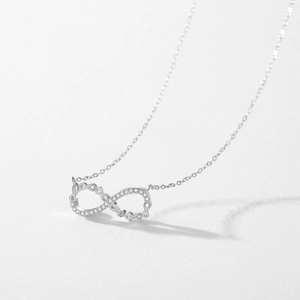 Minimalist S925 sterling silver Möbius necklace with infinity symbol and zircon stones