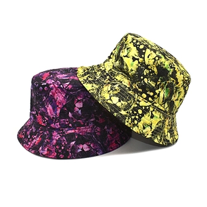 Tie-dye graffiti bucket hats for women with abstract splash print and sun protection