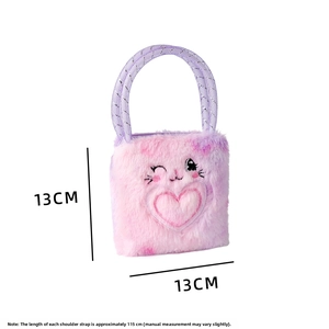 Detail view of pink and purple plush rabbit bag with embroidery and 13x13cm dimensions