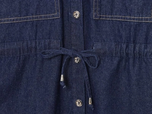 Detail of dark blue denim set featuring waist drawstring, buttons and contrast stitching
