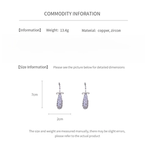 Detailed size specifications for purple drop earrings with cz and bow decoration