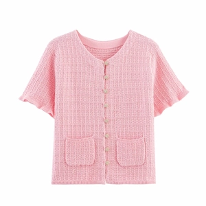 Detailed view of pink short sleeve knit cardigan with metal buttons and front pockets