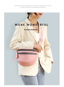 Pink PU leather crescent crossbody bag with adjustable wide strap and metallic zippers