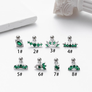 Set of eight silver stainless steel stud earrings with green zircon in various shapes