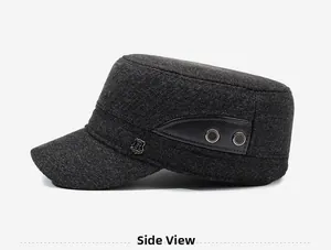 Detail view of dark grey wool flat cap showing knit texture and metal R-logo shield