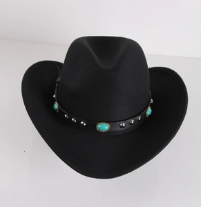 Detail of black felt cowboy hat with leather band featuring silver studs and turquoise stones