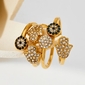Gold Hamsa and Evil Eye ring set with sparkling blue and white rhinestones