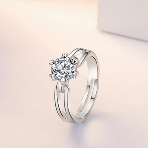Close-up of elegant six-prong setting on a one carat diamond ring with split shank