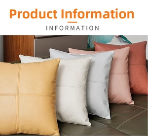 Detail of decorative pillow covers with cross-stitch patterns in five distinct colors