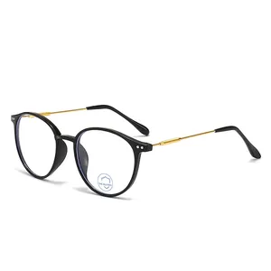 Retro blue light blocking glasses with black round frames and gold metal temples