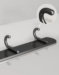 Close-up of black matte stainless steel hooks with safe rounded edges for wall storage