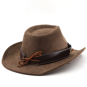 Detail of brown suede cowboy hat with leather band and amber decorative button