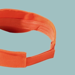 Detail of adjustable Velcro closure on orange sun visor with durable fabric and stitching