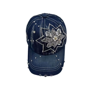 Distressed dark blue denim baseball cap for women with large rhinestone flower embroidery