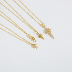 Gold Radiant Star necklaces with mushroom, hand, and star pendants featuring zircon inlays