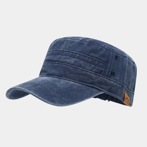 Detailed side view of navy cadet cap with mountain leather patch and metallic eyelets