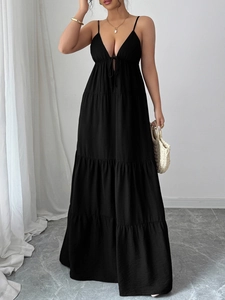 Elegant black tiered maxi dress with spaghetti straps and a deep V-neckline for women